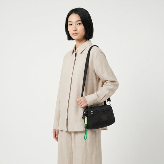 Bolsa Transversal Feminina em Nylon com Múltiplos Bolsos Preto
