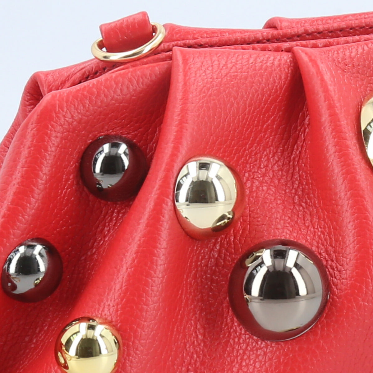 Bolsa em Couro Estilo Clutch com Apliques Metalizado Vermelho