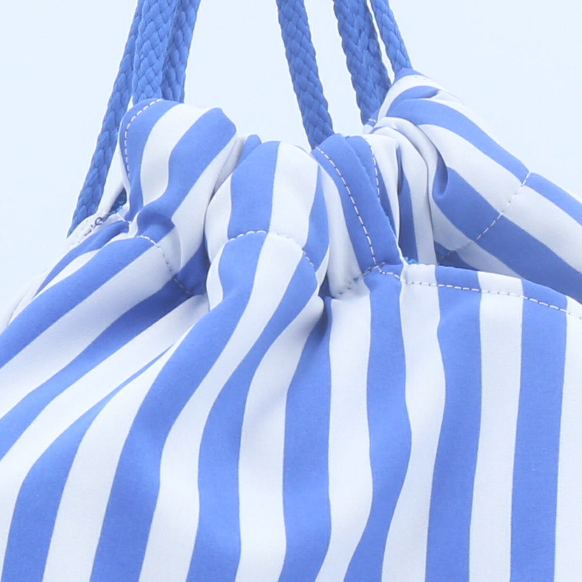 Mochila Saco Atoalhada com Estampa Tropical  Azul claro